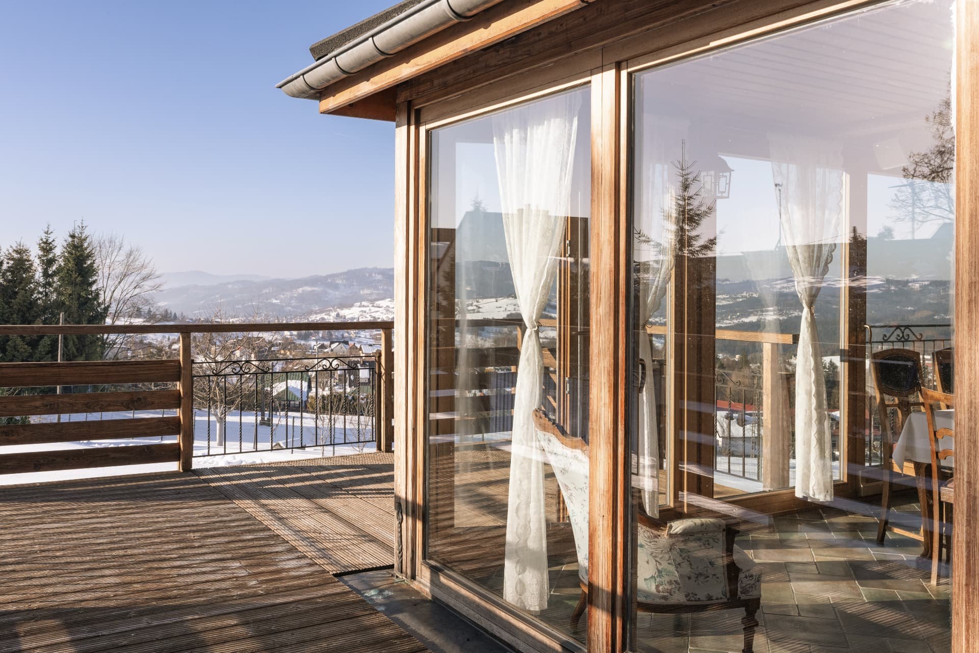 Timber viewing deck beside the panoramic glass veranda overlooking the valley