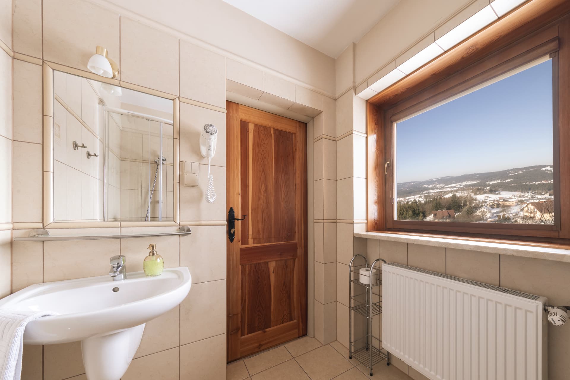 Bathroom with a window view of the mountains